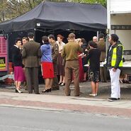 Extras on set for 1940s sequence in the UK