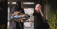 Benny and Claire use Item 47 to rob several banks