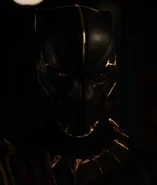 T'Chaka the third known Black Panther in the Marvel Cinematic Universe, portrayed by Atandwa Kani.