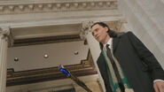 Loki using the Scepter as a Cane.