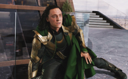 Loki gets assaulted by the Hulk.