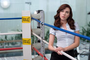 Natasha (as Natalie Rushman) about to take down Happy Hogan.