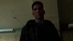 Le Punisher regarde Billy Russo agonisant