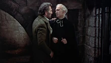 Victor (Peter Cushing) petitions the priest to hear his tale. From Hammer's The Curse of Frankenstein. Source: http://cinematiccatharsis.blogspot.com/2011/07/curse-of-frankenstein