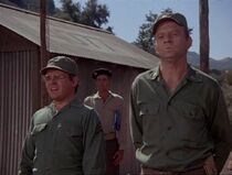 Frank with Radar at the retreat ceremony. Note the soldier in the Australian uniform behind them