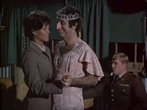 Lots of dancing action at the opening of the Officers Club. Klinger does an elegant dance with Gwen.