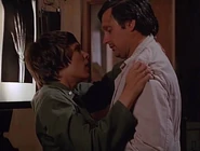 Mitchell-Baker-Mad dogs.jpg (32 KB) The second appearance of Bobbie Mitchell as Baker, this time in "Mad Dogs and Servicemen". Baker's silver 1st Lieutenant's bars are clearly visible.