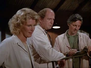 Baker-period of adjustment.jpg (31 KB) Baker discusses the patient Anderson with Winchester and Hawkeye. Scene from "Period of Adjustment".