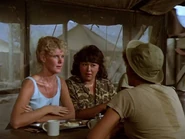Baker-none like it hot.jpg (38 KB) In Season 7 "None Like It Hot", Baker is also in the mess tent. There is a heat wave going on and she overhears Hawkeye mentioning that he has a bathtub. To her left is Kellye. Back to camera is a nurse who might be Lieutenant Jennifer.