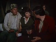 Mitchell-Baker-House arrest.jpg (29 KB) Bobbie Mitchell's Baker again in "House Arrest". She is with Henry and Hawkeye watching a movie in the Swamp.