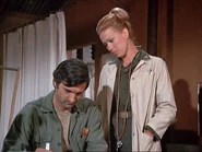 Mettey-Baker-General flipped at dawn.jpg (43 KB) One of the Bakers with the most screen time. Lynette Mettey's Baker with Hawkeye in the Season 3 opener 1"The General Flipped at Dawn". There are many good views of her. This shot is chosen as it shows her 1st Lieutenant's bars clearly.