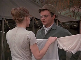 Radar with his paratrooper scarf trying to chat up Nurse Simmons.