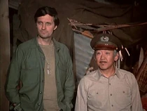 Captain Sam Pak-chosen people.jpg (41 KB) Captain Sam Pak with Hawkeye. Notice Pak's cap badge with the Korean "taeguek" symbol on it. Compare with Charlie Lee's in "To Market, To Market".