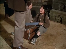 Korean boy-chosen people.jpg (45 KB) A refugee Korean boy shines yet another shoe in the middle of camp.