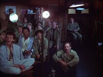 Post op-thats show biz.jpg (39 KB) The audience in Post Op during the rendition of "Sweet Molly Malone". Note the stage lights. Below the light on the left is Jo Ann Thompson. Shari Saba is below the light to the right. Even Winchester (next to Shari) is singing.
