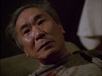 Philip Ahn as the grandfather who insists on the exorcism procedure before being operated on.