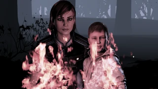 The default female Shepard's nightmare duplicate consumed by fire along with the dead smiling kid