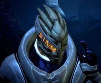 A turian alerts his squad