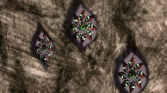 Three eye defenses, with the center powering up