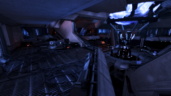 You'll be fighting off waves of geth all the way till you reach the ladder on the far side once you push the button that frees the geth unit