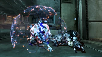 A volus engineer shielding itself from a Cannibal