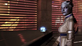Liara e Glifo vicino al pianoforte di Shepard