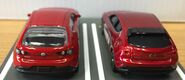 A back view of the 2021 Matchbox 2019 Mazda 3 (left) and 2020 Tomica Mazda 3 (right, 1/66)