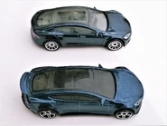 Tesla Model S, Hot Wheels and Matchbox comparison. Hot Wheels bottom, Matchbox top. Facing Right.