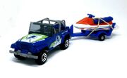 Jeep Wrangler and Watercraft with Trailer (2000)