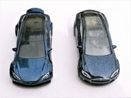 Tesla Model S, Hot Wheels and Matchbox comparison. Hot Wheels left, Matchbox right. Facing Front.