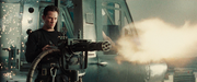 Neo uses the B-212 helicopter's mounted minigun to fire at  Smith, Jones, and Brown