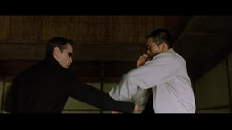 Neo and Seraph fighting on the last table.