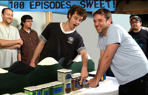 SpMatt and Trey Cutting 100th Episode Cake