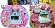 The blue mansion's final packaging, compared to the prototype packaging shown at Toy Fair New York in 2005.