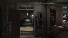 Max standing in the doorway of his apartment.