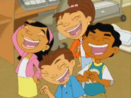 Chrissy, Miguel, Maya, and Theo laughing