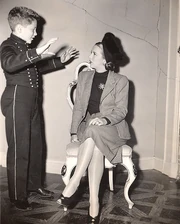 Richard Tyler as a young child with Andrea King in the 1945 film Hotel Berlin