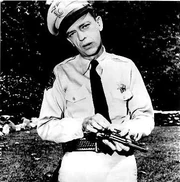 Barney with his gun