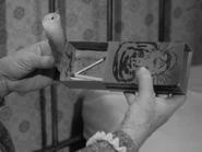 Sacred candle and embleem.jpg (59 KB) The Sacred Candle. The box showing the clubs Wildcat emblem.