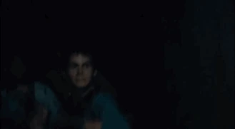 "Thomas hurling his spear like a javelin at a Griever