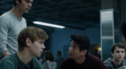 Jack, Thomas, Newt, and Minho in the cafeteria.
