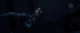 "Thomas and Brenda moving just before the scaffolding crashes down on them