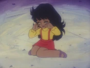 Jun cries after the other kids refuse to play with her because of her color