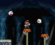 Mario standing near two Boos.