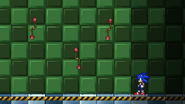 Sonic next to three Flippers on Bomb Factory.