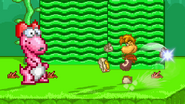 Rayman charging his forward smash near Birdo.
