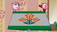 Jigglypuff and Kirby taunting on Desk.