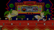 Sonic chasing Tails on Casino Night Zone.