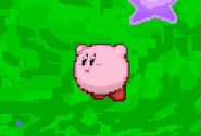 Kirby using one of his midair jumps, on Dream Land.