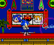 Sonic taunting in front of the slot machine.